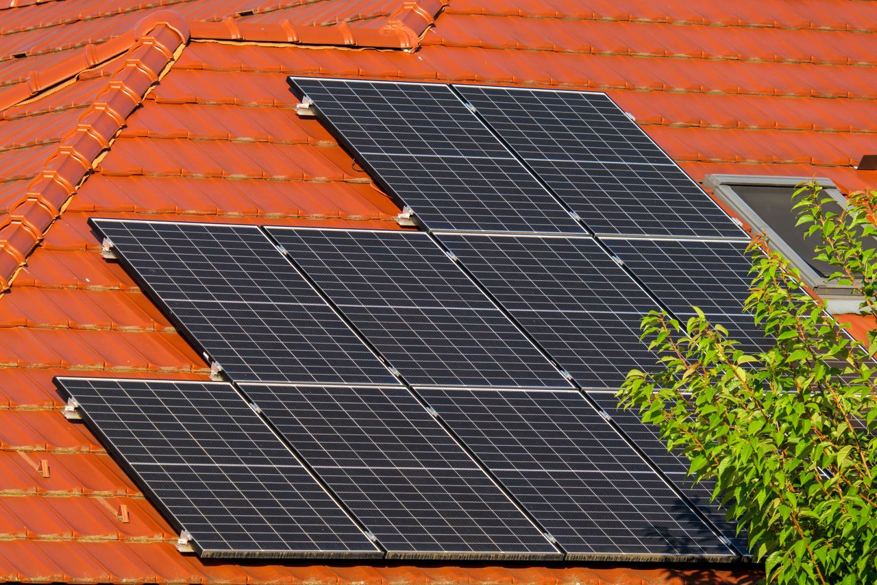 Crafting Captivating Headlines: Your awesome post title goes here Close-up of solar panels on a red tiled roof in Croatia, highlighting renewable energy.